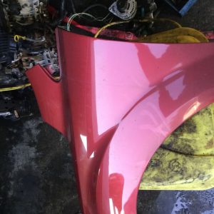 FORD FOCUS 2009 C.C N/S FRONT WING IN METALLIC  RED